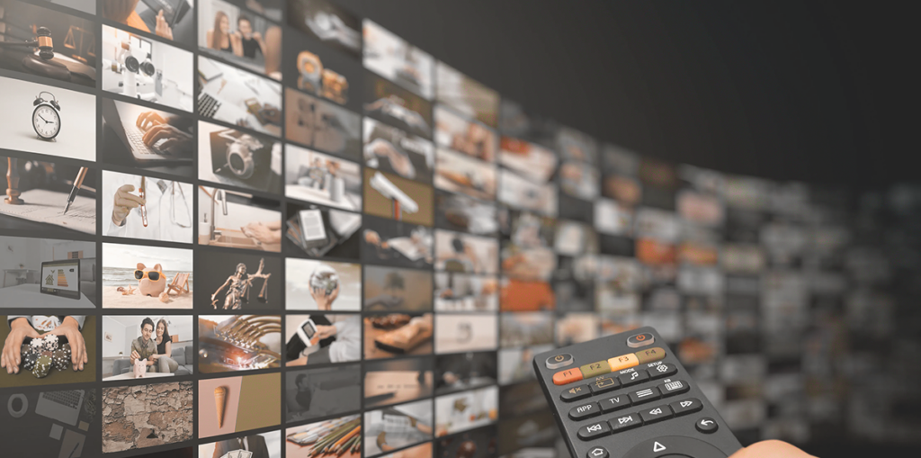 Remote pointing toward several tv screens. Streaming. SubScape product.