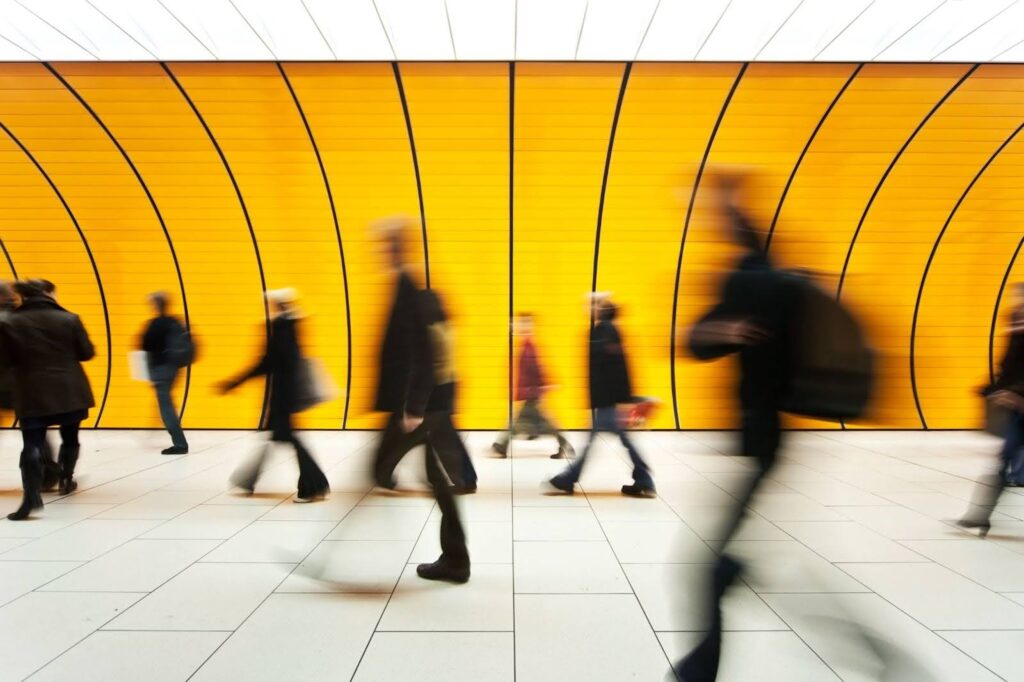 CTAM image for emotional connection in media. people in motion walking by.